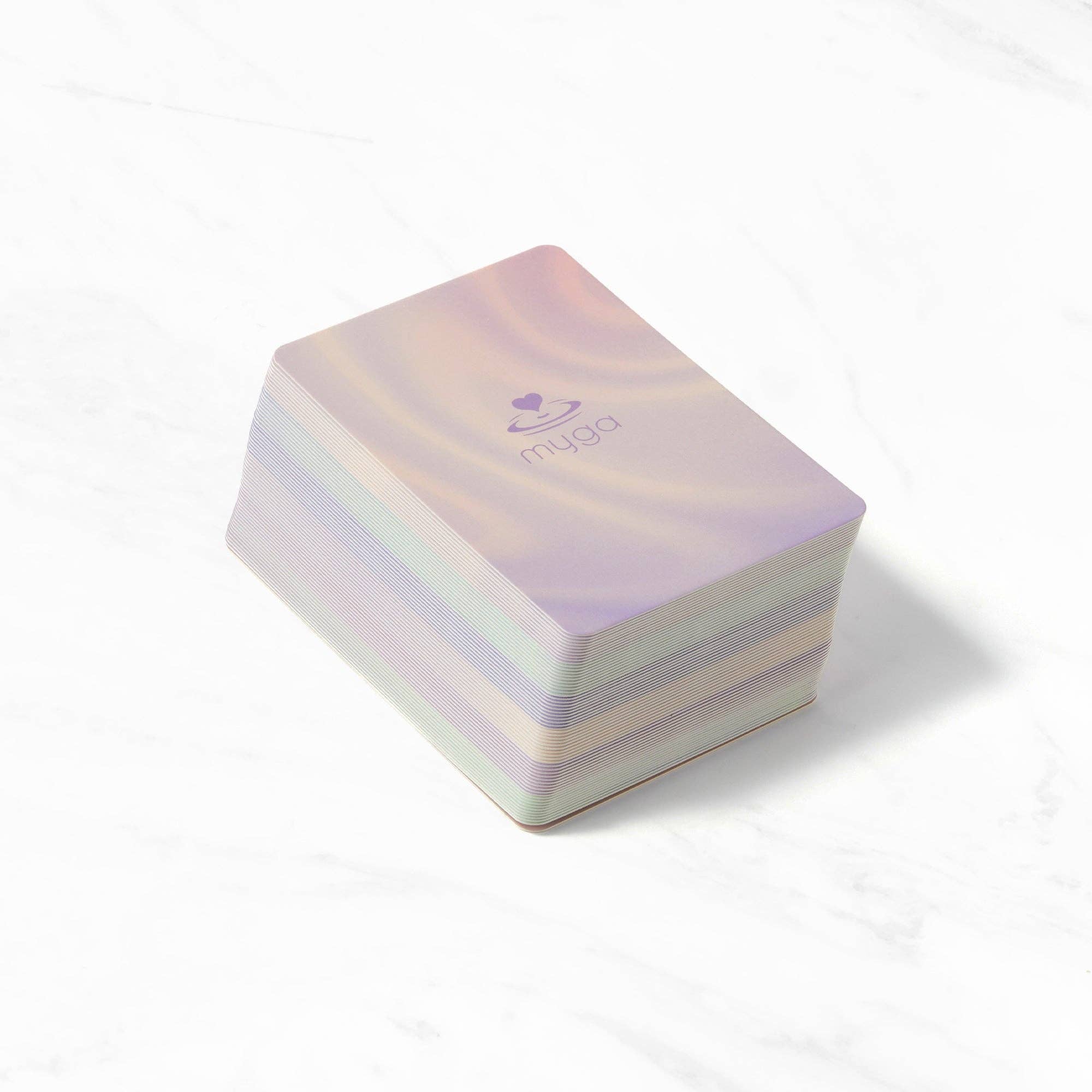 Iridescent yoga block with a brand logo.