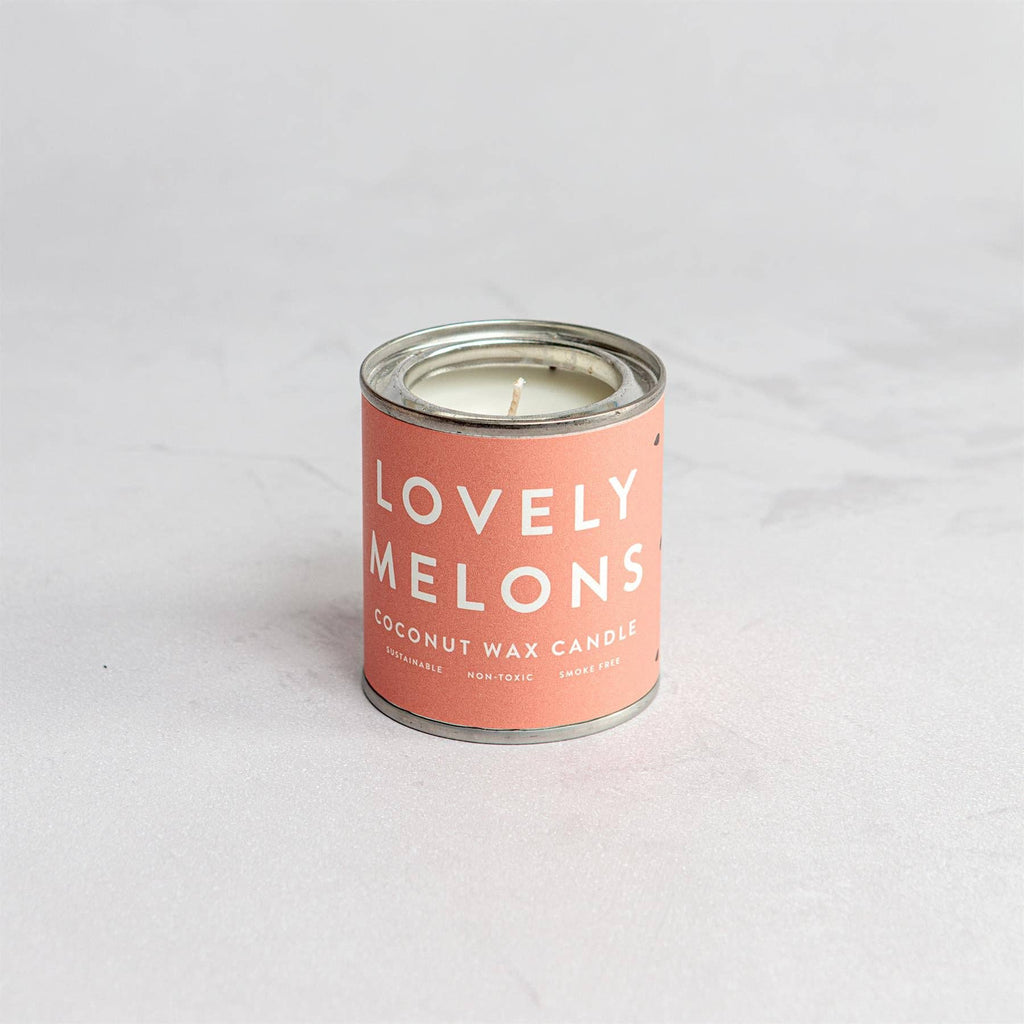 Lovely Melons coconut wax candle in a paint-can-style tin with a soft pink label featuring bold white text. Eco-friendly, non-toxic, and smoke-free—ideal for relaxing, fruity aromatherapy and gift boxes.