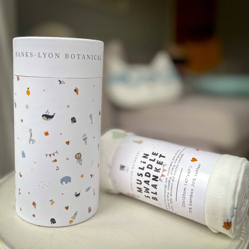 Muslin swaddle blanket with packaging.