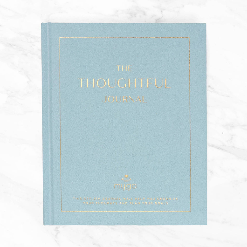 Light blue journal with 'The Thoughtful Journal' text in gold.