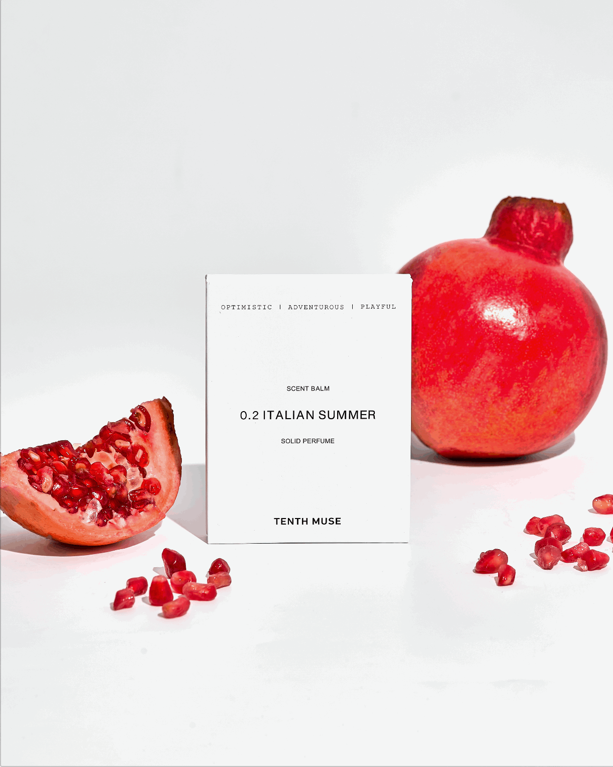 Pomegranate fruit and a box labeled 'Tenth Muse'.