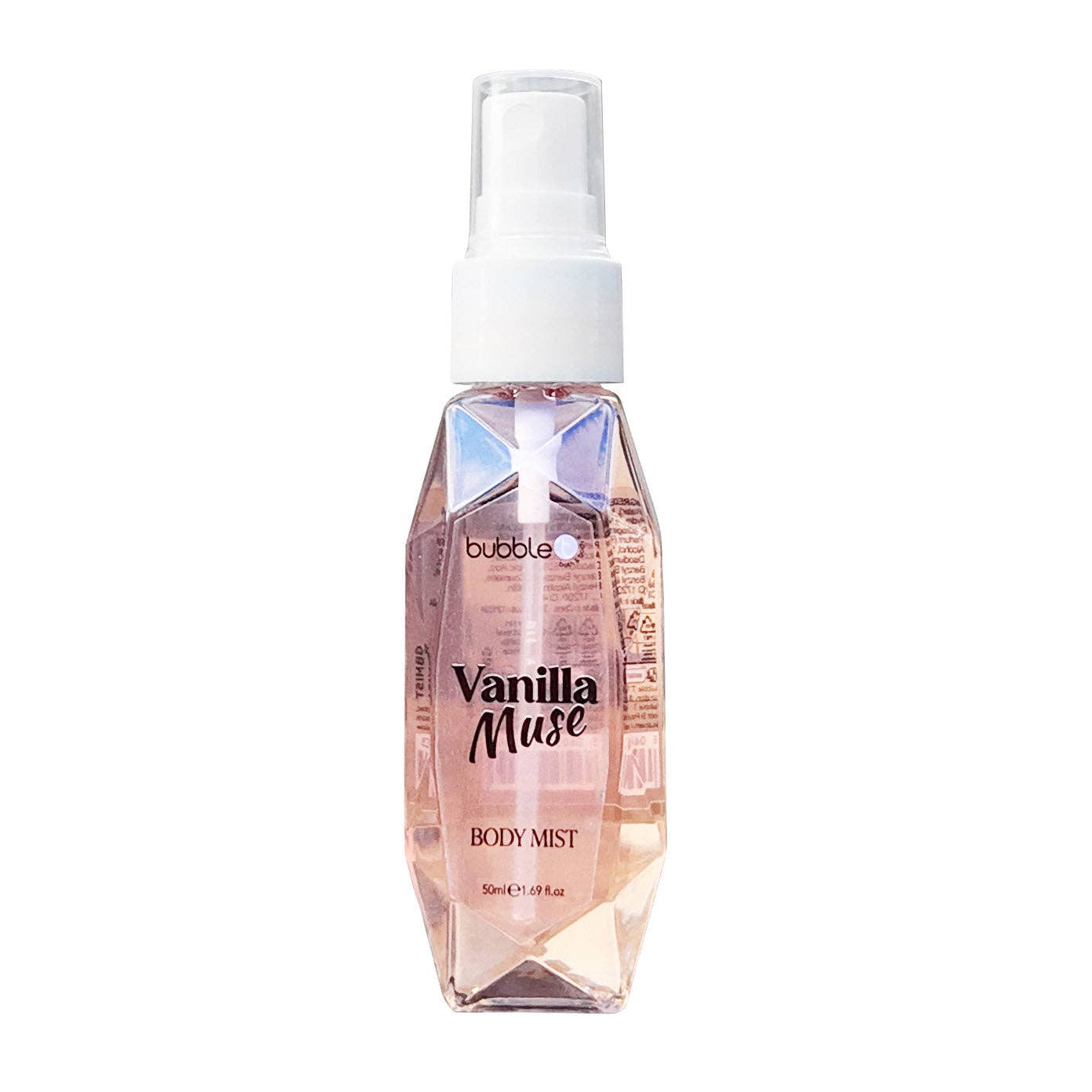 A 50ml Vanilla Muse Body Mist by Bubble T, housed in a faceted, gem-like clear plastic bottle with a soft peach-pink hue. The bottle features a white spray nozzle and cap, and minimalist black text on the front. Its modern, crystal-inspired design reflects light beautifully, giving it a luxurious, feminine appearance.