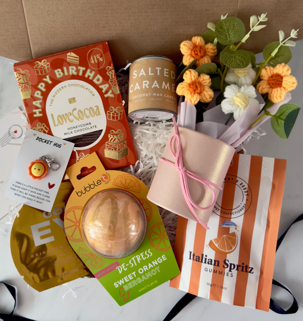 Gift box with birthday chocolate, bubble bath.
