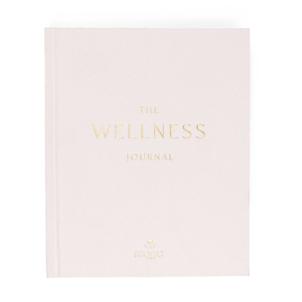 Pink journal titled 'The Wellness Journal'.