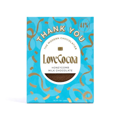 LoveCocoa honeycomb milk chocolate packaging with blue and gold design.