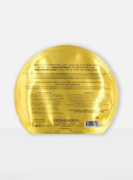 Yellow eye mask packaging with text.
