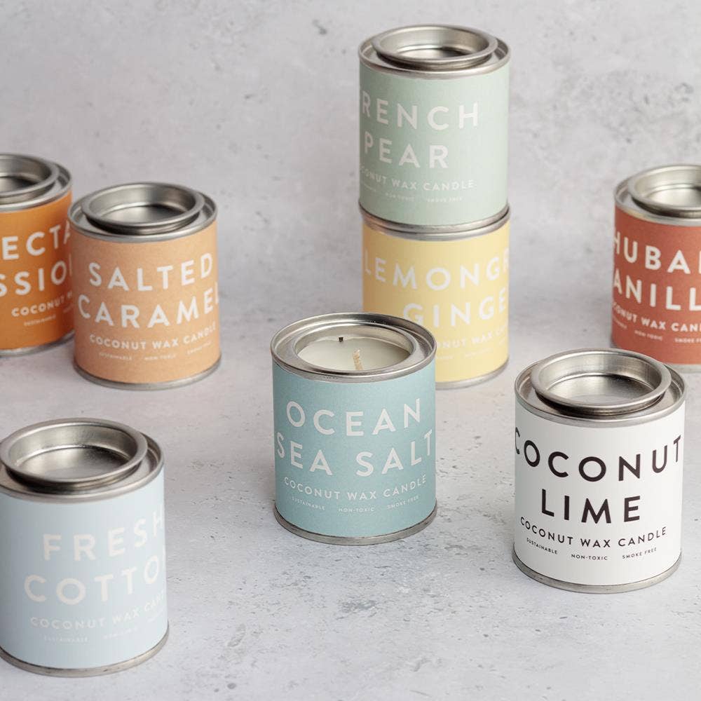 Collection of coconut wax candles in various scents.